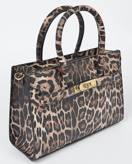 Close-up of leopard print handbag with gold hardware and a structured silhouette.
