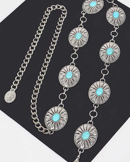 Silver western chain belt styled on mannequin with turquoise stone medallions

