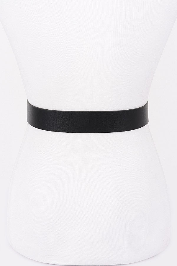 Floral scroll engraved buckle on faux leather waist belt

