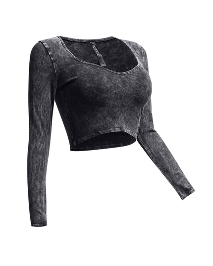 Right side view of black vintage wash crop top with form-fitting long sleeves.
