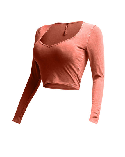 eft side view of rust vintage wash long sleeve crop top with a fitted design.