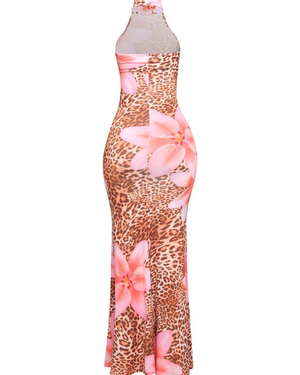 Open back halter maxi dress in bold leopard floral print with curve-accentuating fit and flared hemline