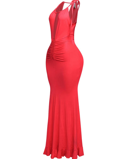 Side view of red plunge halter dress showing flared hemline and slim fit


