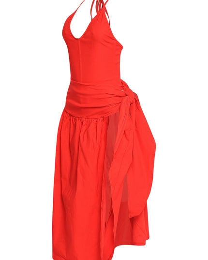 Vibrant red cutout dress with open overlay skirt, plunging neckline, and woven stretch fabric