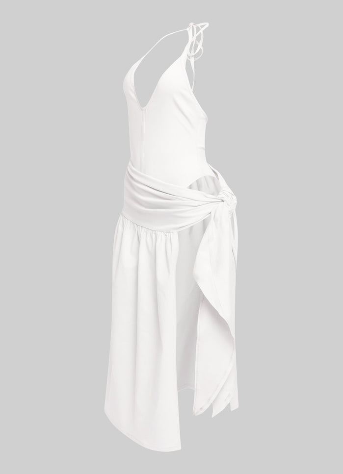 Chic white dress with tie-side open skirt and deep V neckline for summer styling