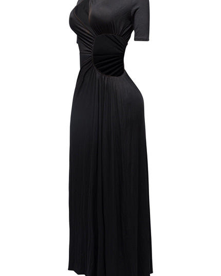 Minimalist black maxi with twist detailing, soft drape, and elevated night-out styling

