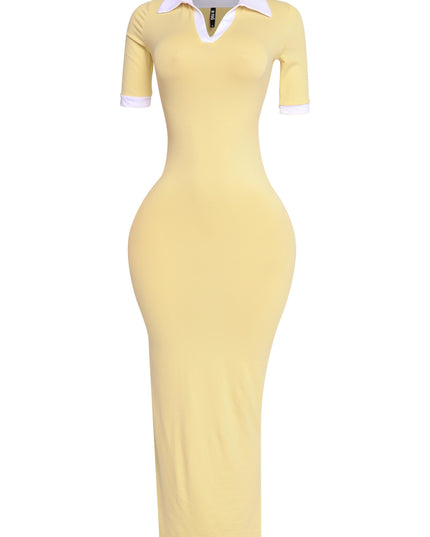 Yellow and white polo-style dress with short sleeves, side profile showing athletic chic silhouette

