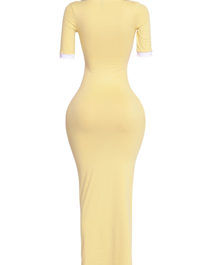 Back view of yellow and white bodycon maxi dress with white contrast details and sleek stretch fit

