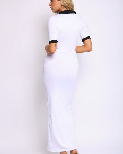 White bodycon maxi dress with black contrast collar and sleeves, front-facing view

