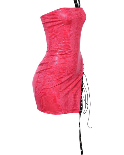 Pink faux leather party dress with cutout lace-up detail and glossy texture

