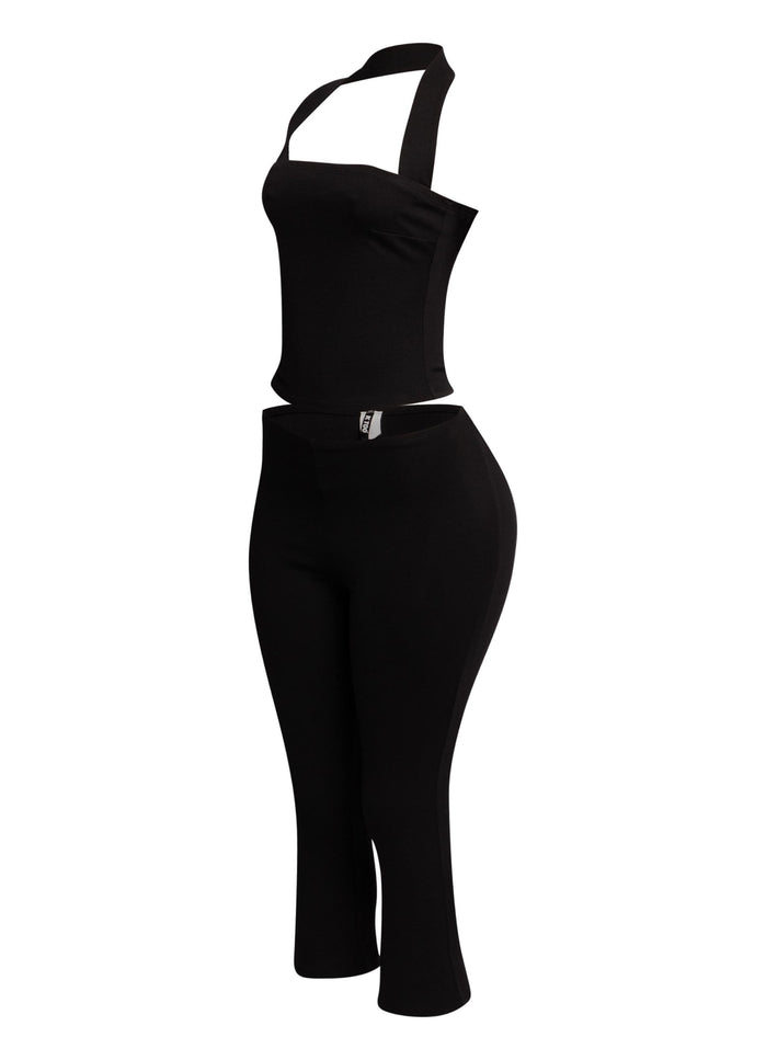 Fashion-forward halter top and capri pant set, offering a modern and flattering silhouette for any stylish occasion.