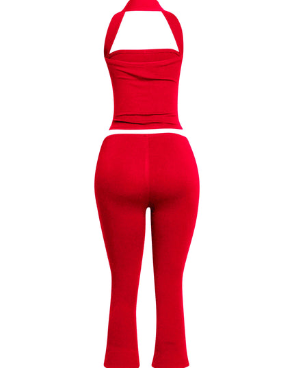 Fiery red halter neck top with matching capri pants, delivering a sleek and daring silhouette for fashion-forward events and valentine