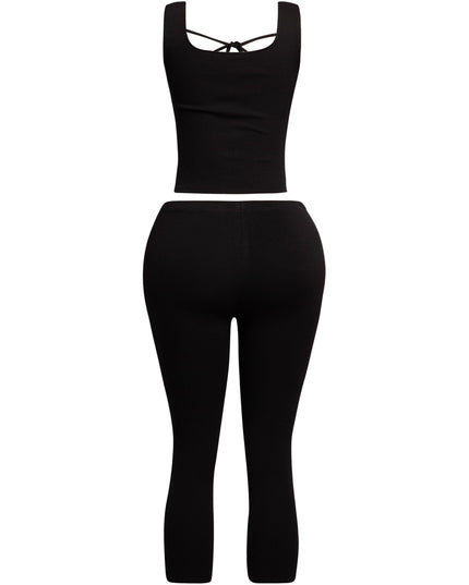 Trendy black tie-front tank top and capri pant set, designed for stylish and effortless day-to-night transitions.