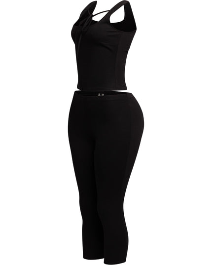 Sophisticated black tank top with a tie-front detail and matching capri pants, ideal for a sleek, fashion-forward vibe.