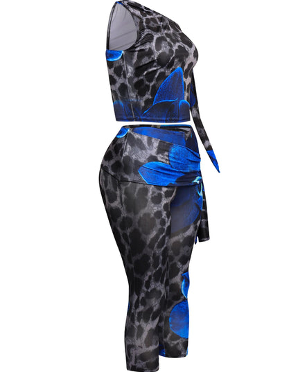Full-body angle showing bold blue print two-piece with adjustable side ties and slim fit

