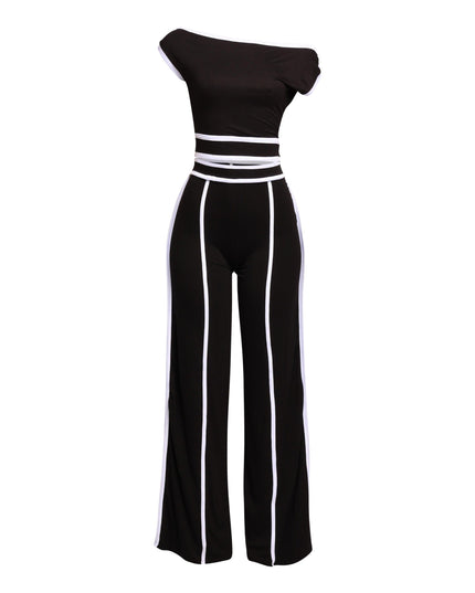 Bold color-contrast off-shoulder pant set with striking white trim, perfect for edgy and statement-worthy looks.