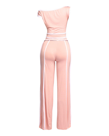 Blush pink and white two-piece pant set featuring an off-shoulder top and wide-leg pants for a stylish yet elegant vibe.