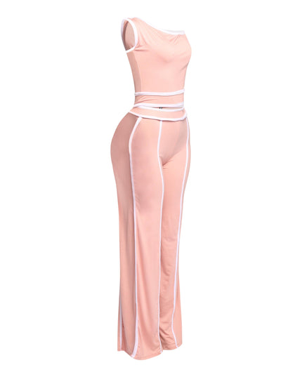 Trendy pastel pink off-shoulder pant set with sleek white accents, ideal for day-to-night transitions or statement outfits.