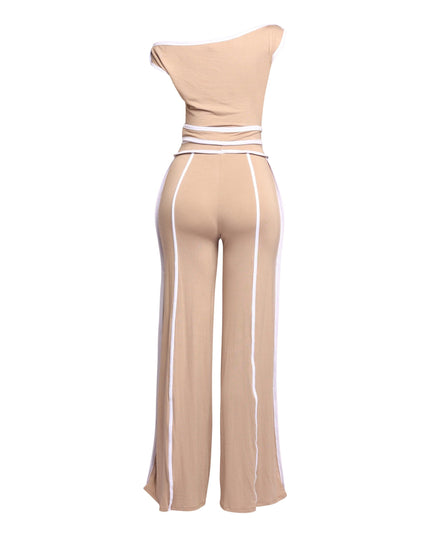 Chic beige off-shoulder top with matching high-waisted wide-leg pants, featuring crisp white accents for a modern look.
