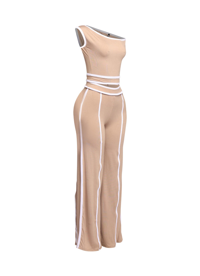 Trendy beige and white color-block two-piece set with off-shoulder top and flowing wide-leg pants, perfect for day-to-night outfits.