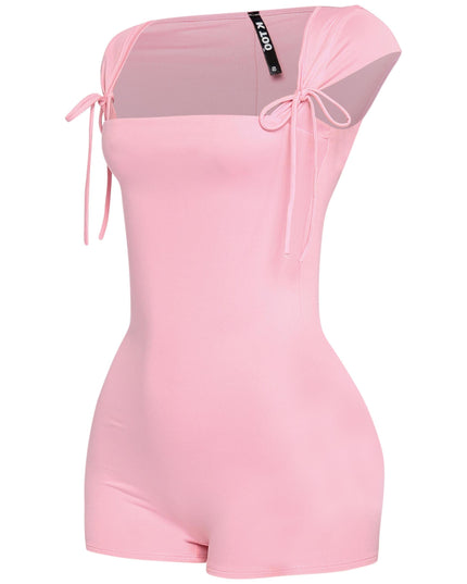 Pastel pink one-piece romper with stretchy bodycon fit and adjustable shoulder ties

