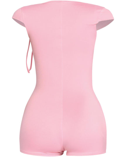 Rear view of baby pink cap sleeve romper with tight silhouette and short hem


