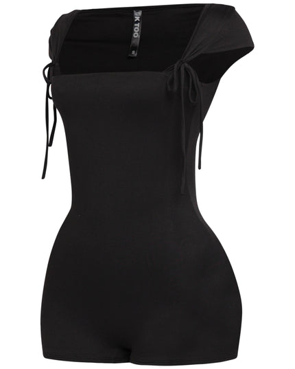 Rear view of black cap sleeve romper with short inseam and snug stretchy fit

