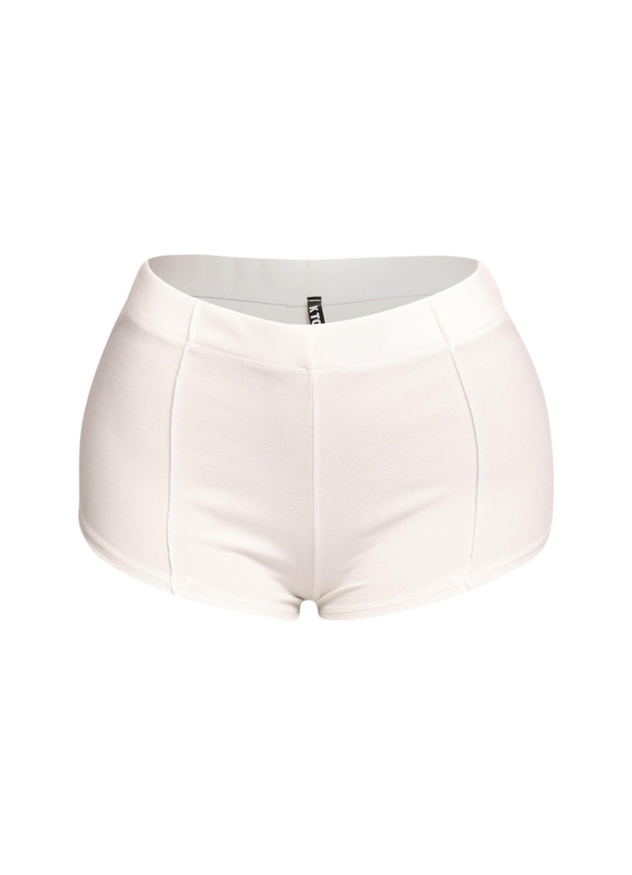 High-waisted micro mini shorts in white with a pintuck detail and elastic waistband, designed for a sleek and flattering fit. Perfect for a trendy and daring casual look.
