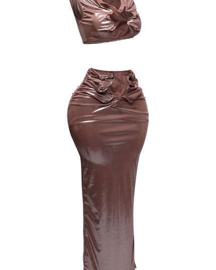 Side profile of foiled tank top with cutout and flex wire design paired with maxi skirt
