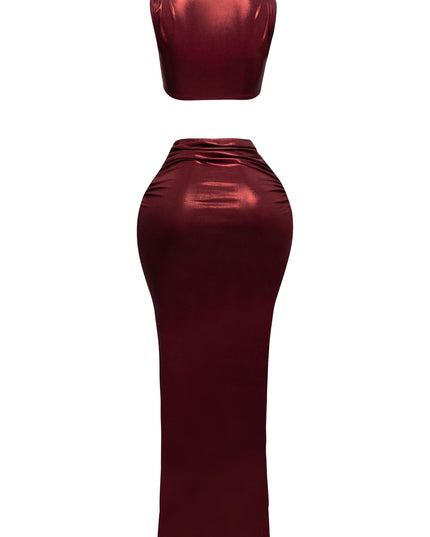 Full back shot of the foiled tank top and maxi skirt, showing a curve-hugging silhouette.