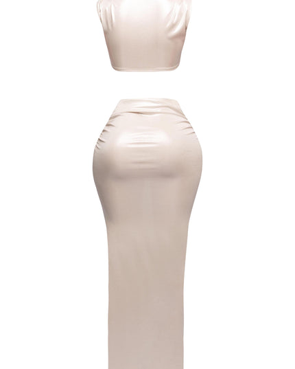 Back view of the flex wire tank top and maxi skirt, with shimmering fabric detail.