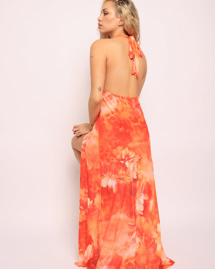 • Sitting pose in orange skirt set showing stretch fabric and layered silhouette

