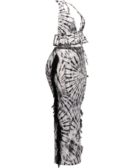 Monochrome tie-dye festival outfit with dramatic fringe and bold ruffle details

