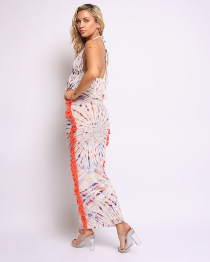 Model in boho-inspired swirl print set with fringe and body-hugging fit

