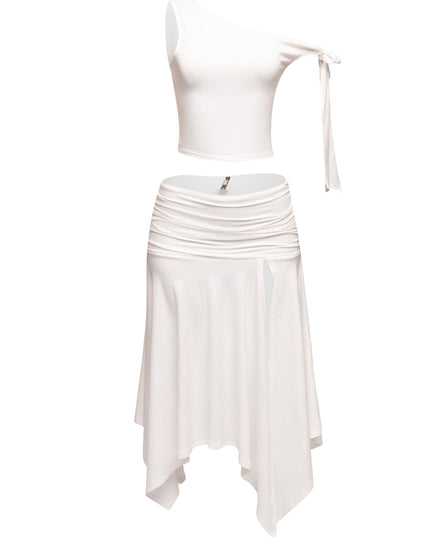 Chic off-shoulder asymmetrical top with tie detail paired with a high-slit skirt, perfect for a night out.