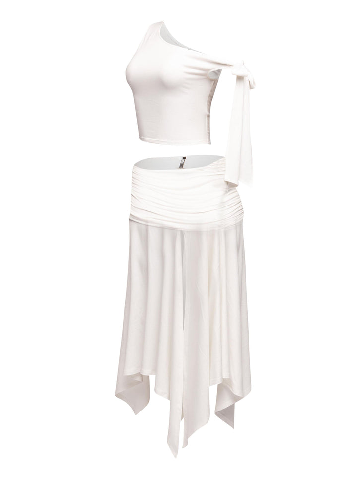 Fashionable off-shoulder asymmetrical top with tie detail, complemented by a high-slit skirt for a sophisticated ensemble.
