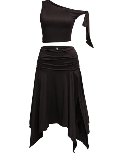 Sleek and sexy off-shoulder asymmetrical crop top with tie detail, styled with a flowing high-slit skirt for a bold statement.