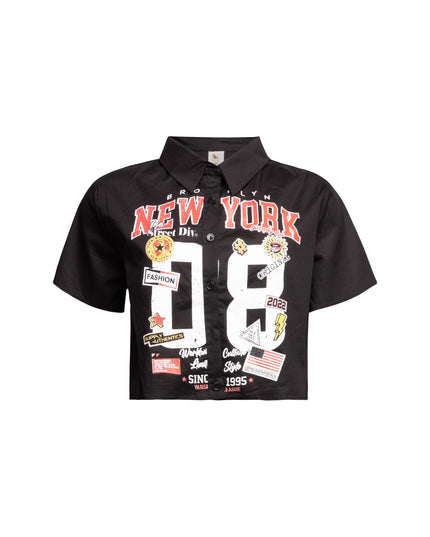 Front view of black New York-themed graphic shirt showcasing bold numerals and city motifs.