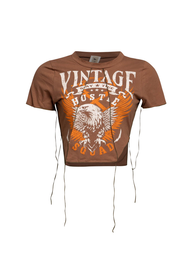 Front view of Vintage Hustle Lace-Up Tee in brown with eagle graphic and "Hustle Squad" text.