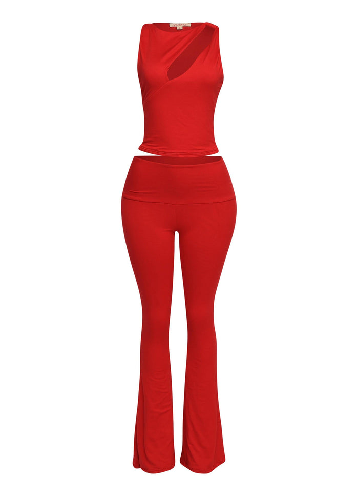 Hot red matching set with body-contouring pants and cut-out detail top for going out

