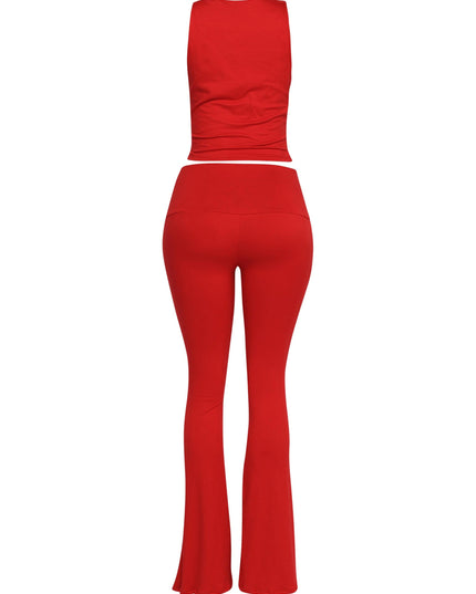 Flattering red twist-strap top and flare pants in soft stretch jersey, perfect for party looks

