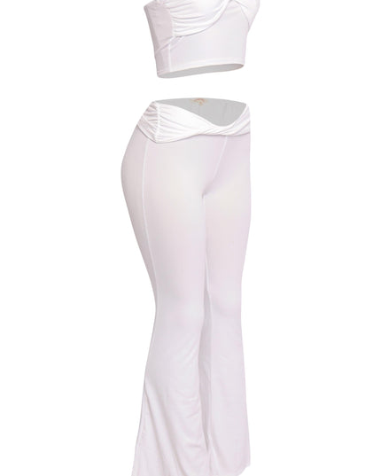 White matching set with crossover waist detail and figure-hugging silhouette

