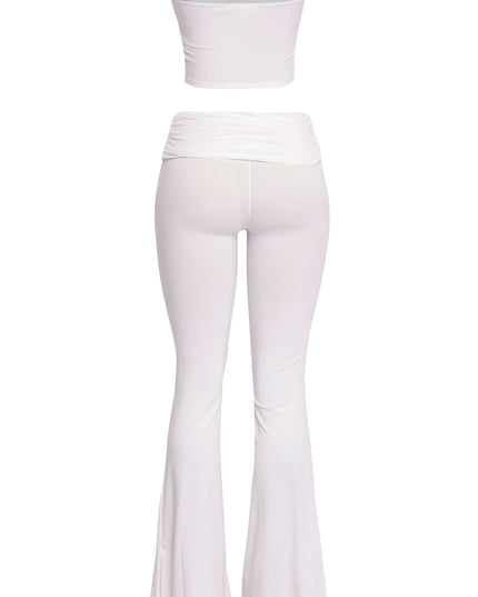 Clean white bandeau and flare pant outfit with elevated basics vibe

