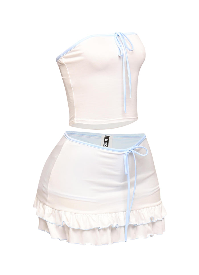 White tube top and skirt outfit with soft blue ties, retro Y2K flair, and lightweight polyester spandex blend