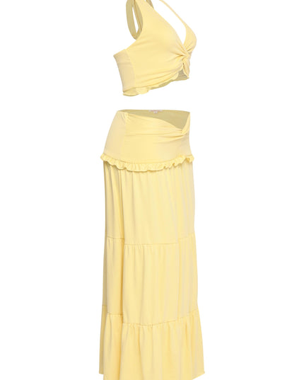 Yellow maxi skirt and crop top set with feminine silhouette and flirty charm

