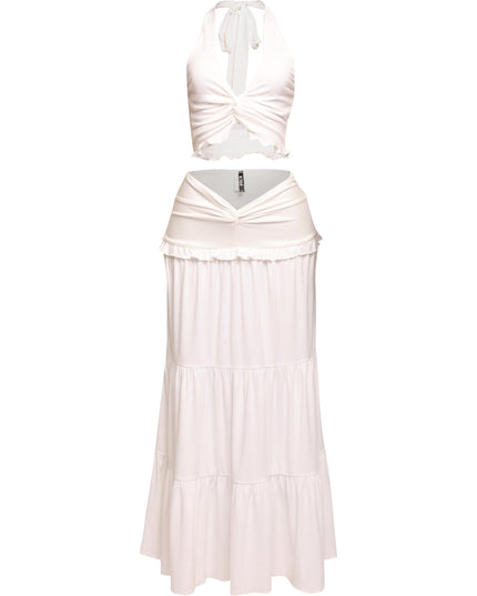 White beach-ready outfit with halter tie-back and merrow hem details

