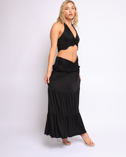 Flowy black two-piece set with plunging neckline and elastic waistband skirt

