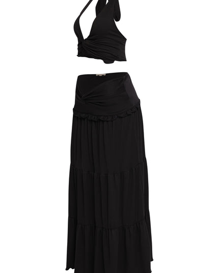 All-black summer outfit with tiered silhouette and sultry halter top

